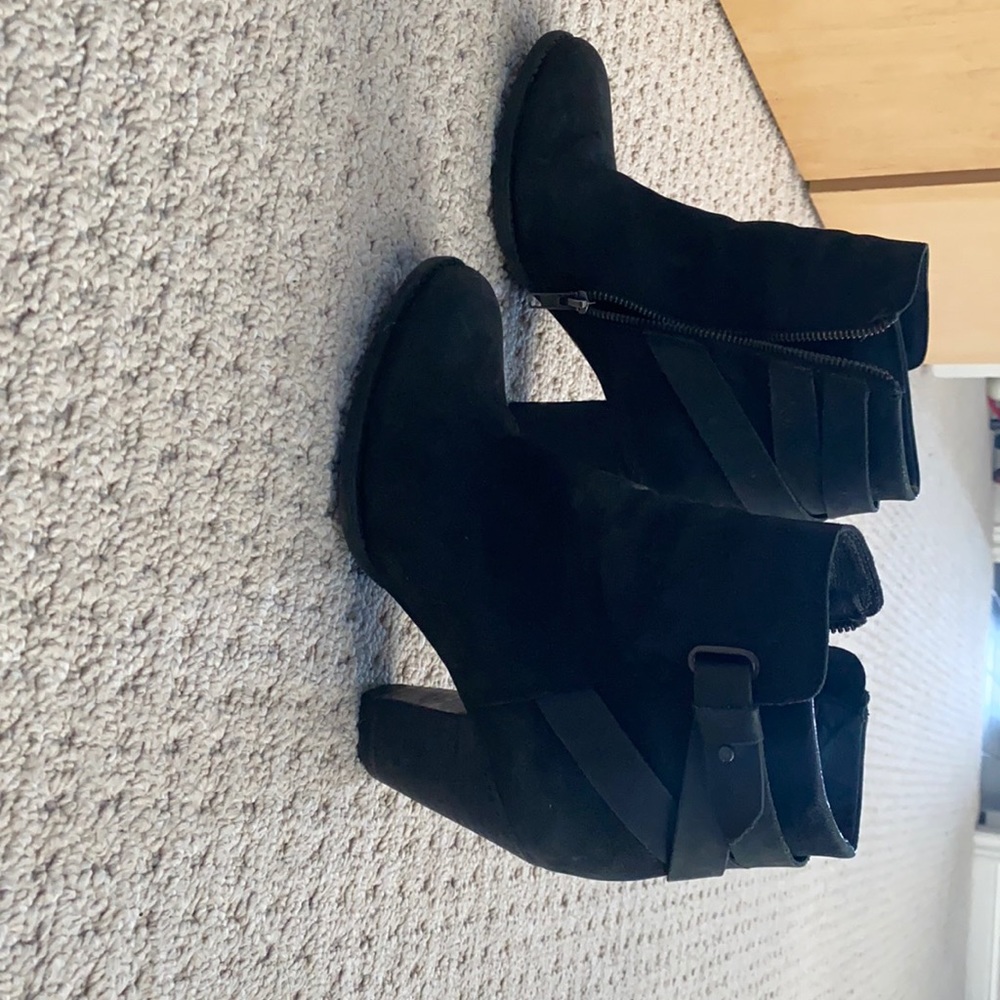 Short black booties with side zip.